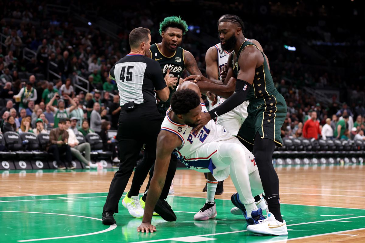 Boston Celtics' Jaylen Brown, right, goes up to shoot against Philadelphia  76ers' Paul Reed during the first half of Game 4 in an NBA basketball  Eastern Conference semifinals playoff series, Sunday, May